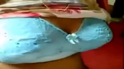 A young college girl with big boobs show in a video call