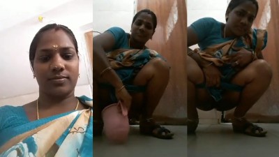 Trichy Teacher lifts saree and peeing in a bathroom
