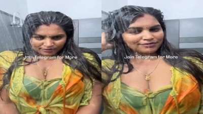 Mature aunty actress bathing with her huge boobs