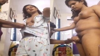 Young lover jerking shemale dick before giving blowjob