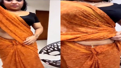 Kerala aunty tempting big mulai on orange saree